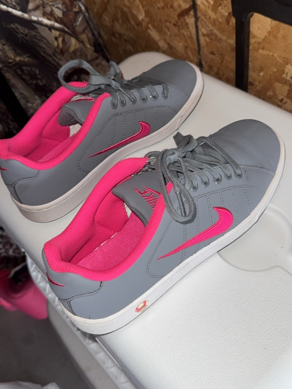 Nike Women's Gray Sneakers with Pink Accents